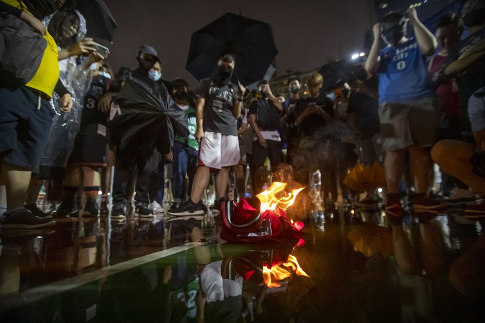 Hong Kong protestors burning LeBron's jersey